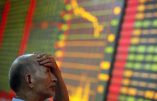 A stock investor reacts near a board displaying stock prices at a brokerage house in Huaibei in central China's Anhui province Monday June 24, 2013. Global stock markets reeled Monday, with Shanghai's index enduring its biggest loss in four years, after China allowed commercial lending rates to soar in a move analysts said was aimed at curbing a booming underground lending industry. (AP Photo) CHINA OUT