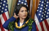 FILE - This Jan. 3, 2013 file photo shows Rep. Tulsi Gabbard, D-Hawaii, waiting for a photo with House Speaker John Boehner, of Ohio, on Capitol Hill in Washington. Gabbard is the first Hindu elected to Congress. Rep. Ami Bera of California, also a Democrat, is the third Indian-American to serve in the House. Gabbard, however, isnt from India, where Hinduism originated and to which the vast majority of its adherents have ethnic ties. (AP Photo/J. Scott Applewhite, File)