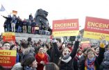 Several thousand people gather in a square to attend the "Marche Pour la Vie" (March for Life) anti-abortion protest march on the eve of an ammendment vote at the National Assembly in Paris, January 19, 2014. Signs reads, "Pregnant - And if You Kept It?".   REUTERS/Gonzalo Fuentes (FRANCE  - Tags: POLITICS)