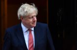 Britain's Prime Minister Boris Johnson walks out of the door of 10 Downing street to greet the emir of Qatar Sheikh Tamim bin Hamad al-Thani prior to their meeting in central London on September 20, 2019. (Photo by Ben STANSALL / AFP)