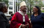 FILE  - In this Sunday Oct. 6, 2019, file photo, Washington D.C. Archbishop Wilton Gregory greets churchgoers at St. Mathews Cathedral after the annual Red Mass in Washington. Pope Francis on Sunday, Oct. 25, 2020, named 13 new cardinals, including Washington D.C. Archbishop Wilton Gregory, who would become the first Black U.S. prelate to earn the coveted red hat. In a surprise announcement from his studio window to faithful standing below in St. Peter’s Square, Francis said the churchmen would be elevated to a cardinal’s rank in a ceremony on Nov. 28.  (AP Photo/Jose Luis Magana, File)