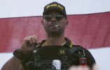 FILE - In this Sept. 26, 2020, file photo, Proud Boys leader Henry "Enrique" Tarrio wears a hat that says The War Boys during a rally in Portland, Ore. Police in the nation’s capital on Jan. 4, 2021, arrested the leader of the Proud Boys, who is accused of burning a Black Lives Matter banner that was torn down from a historic Black church in downtown Washington in December 2020. (AP Photo/Allison Dinner, File)